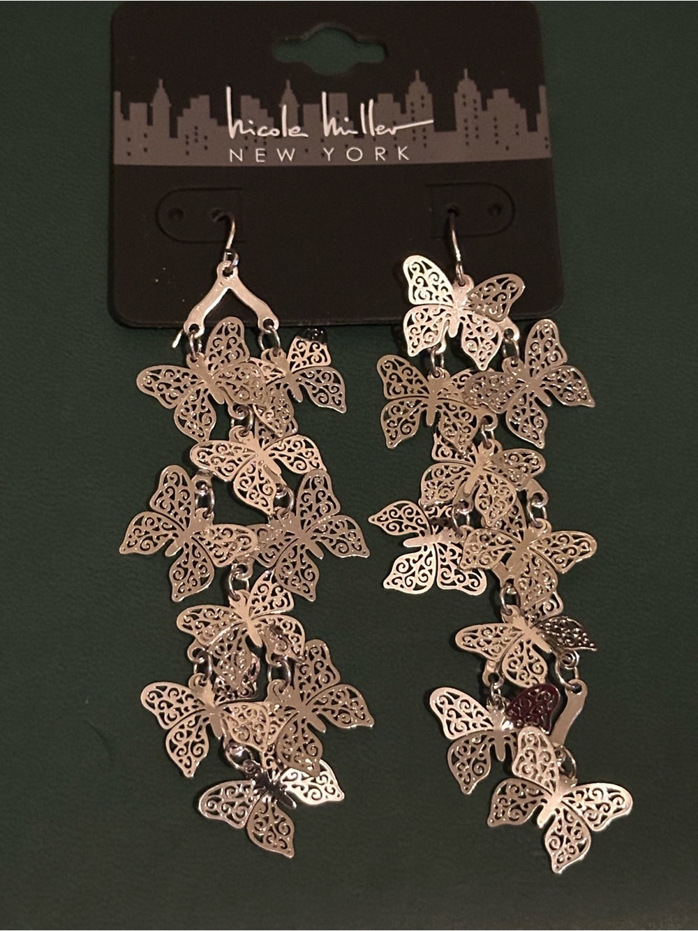 NWT Nicole Miller Silver-tone Filigree Butterfly Cascade Earrings. 3”L x 1”W.